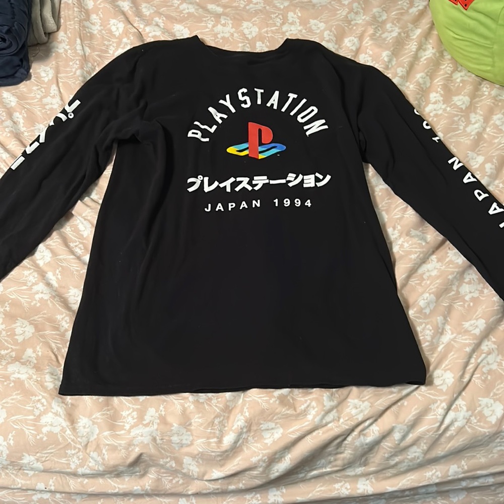 Black long sleeve shirt with PlayStation symbol